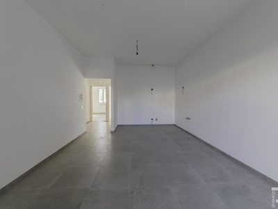 Helle Neubauwohnung mit zwei privaten Gärten