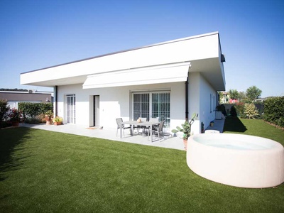Modern villa surrounded by greenery